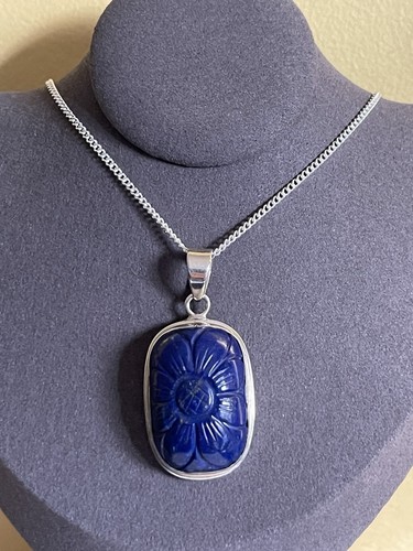 Sterling silver and carved - sterling,