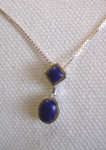 Silver pendant set with 2 - ,